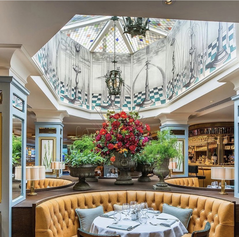 Commercial spray painting The Ivy restaurant interior blue woodwork