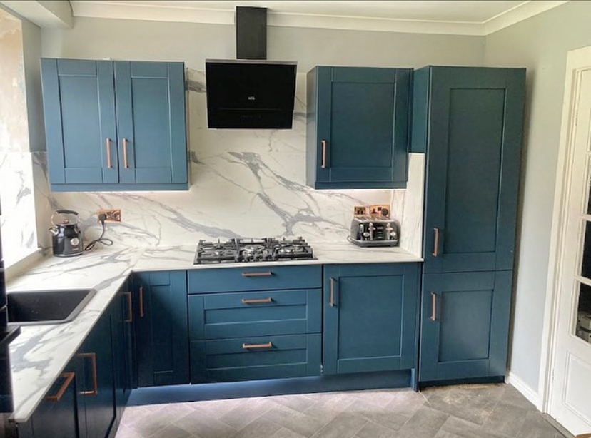 Teal petrol blue kitchen with marble splashback Yorkshire